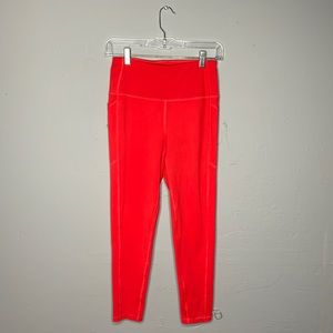 Size small bright red leggings it’s pockets